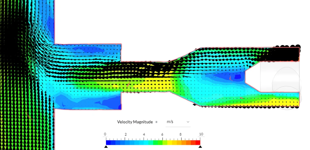 Flow simulation in SimScale showing velocity magnitude through a nozzle 